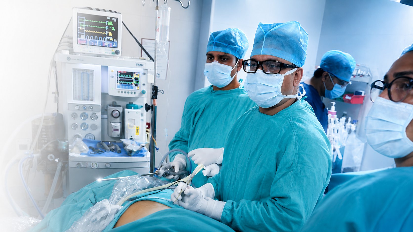Dr. Sanjeev Gupta and surgical team performing laparoscopic surgery